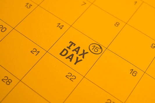 Calendar shows tax day circled on the 15th.